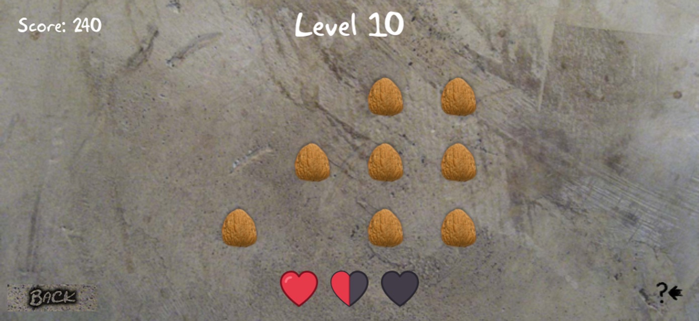 Mid-game board with matched pairs cleared and hearts partly spent