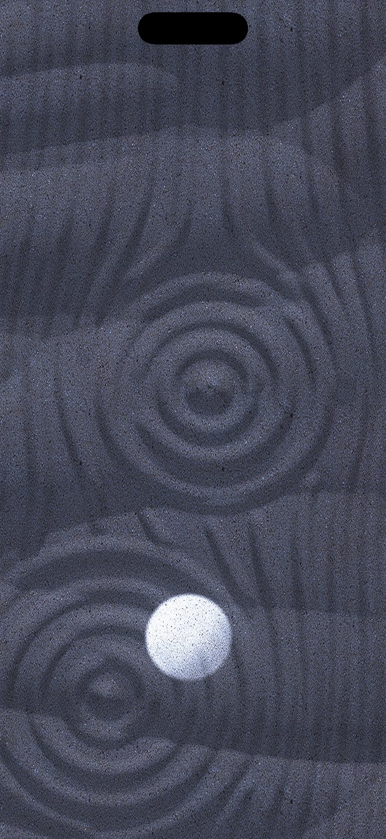 the same raked sand under moonlight